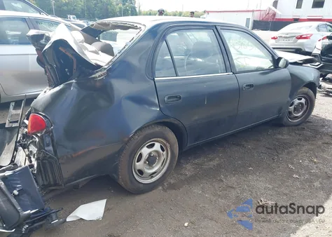 2001 Toyota Corolla Ce from USA, damaged, VIN 2T1BR12E21C388319